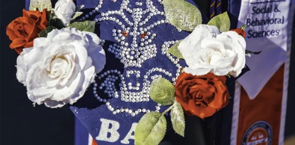 Graduation cap with ingrained Wildcat symbol.