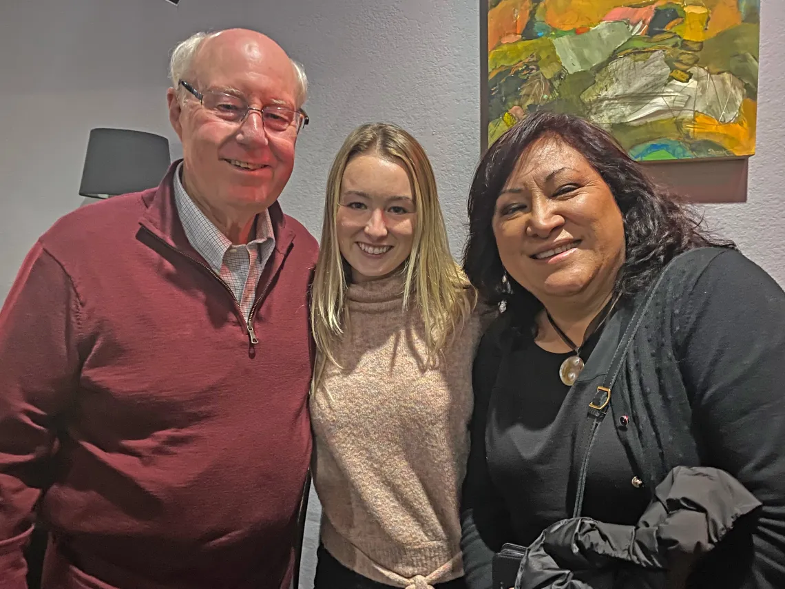 Bill Jamieson and his granddaughter Hunter Metcalf with Journalism School Director Jessica Retis.