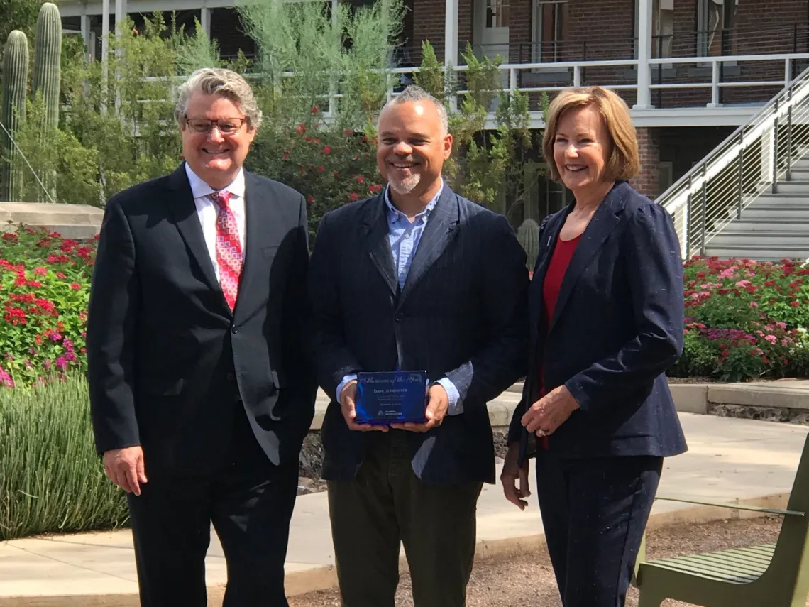 SBS Alumnus of the Year Dave Schechter (center) with John Paul Jones III, dean of the College of Social and Behavioral Sciences, and Melinda Burke, president of the UA Alumni Association.