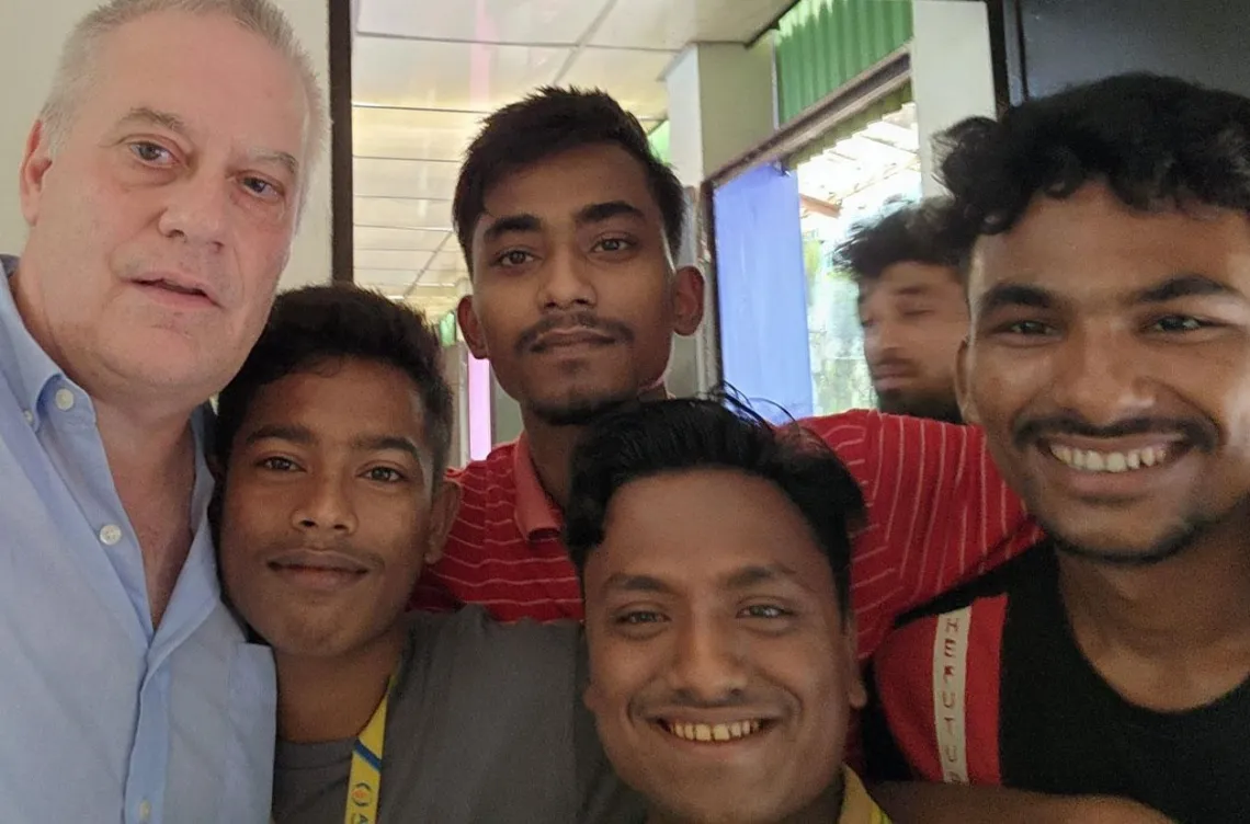 Bill Simmons with four men from Bangladesh