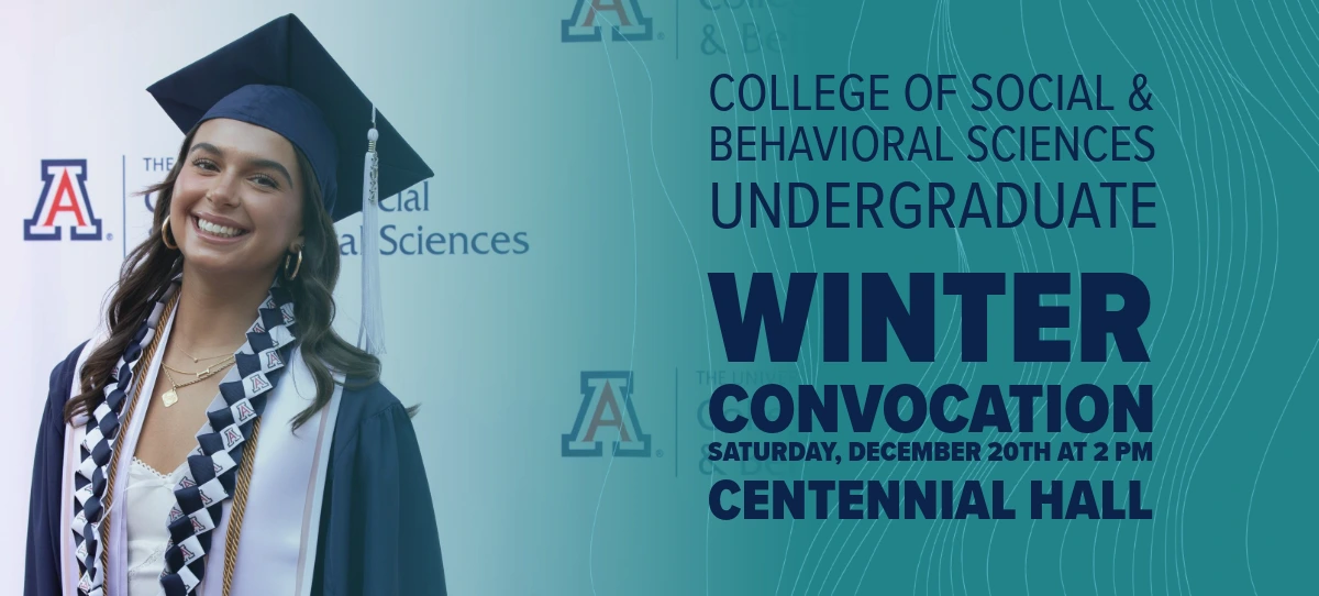 young woman with brown hair in U of A graduation regalia