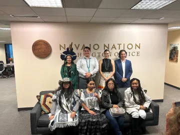 Vince Redhouse and seven international Indigenous youth at the Navajo Nation Washington Office in D.C.