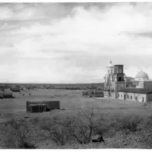 Mission San Xavier del Bac, showing small Indian structures, Tucson, Arizona, ca.1898-1900