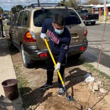 Patrick Robles planted trees in South Tucson as part of the Trees for Tucson project.