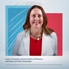 Dean Lori Poloni-Staudinger stands in a red shirt and white jacket in front of a red, white and blue graphic background