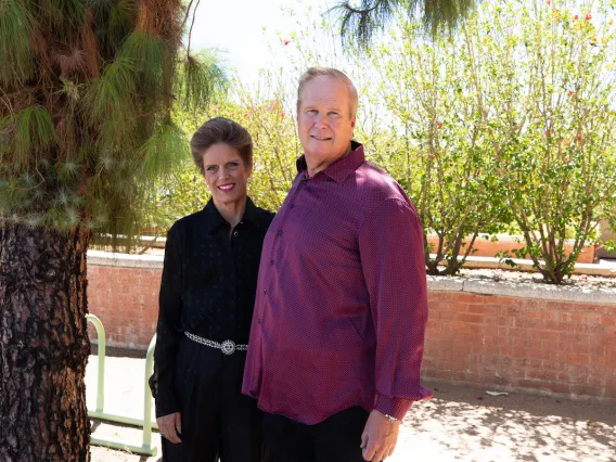 Sarah Bissell Peters and Rolf Peters standing together outiside