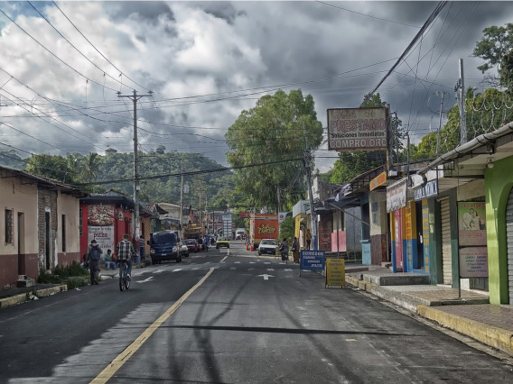 Street with trees and colorful buildings in El Salvador