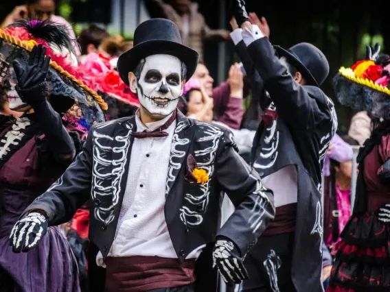 A scene from a Día de los Muertos parade in Mexico City in 2018. 