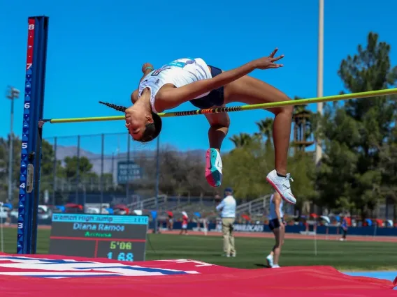 Diana Ramos doing high jump 