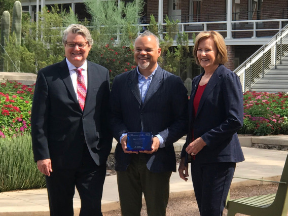 SBS Alumnus of the Year Dave Schechter (center) with John Paul Jones III, dean of the College of Social and Behavioral Sciences, and Melinda Burke, president of the UA Alumni Association.  