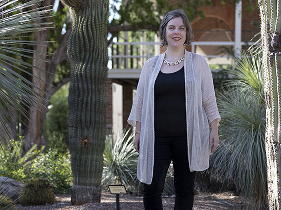Elizabeth Baldwin at the University of Arizona campus by a sagauro.