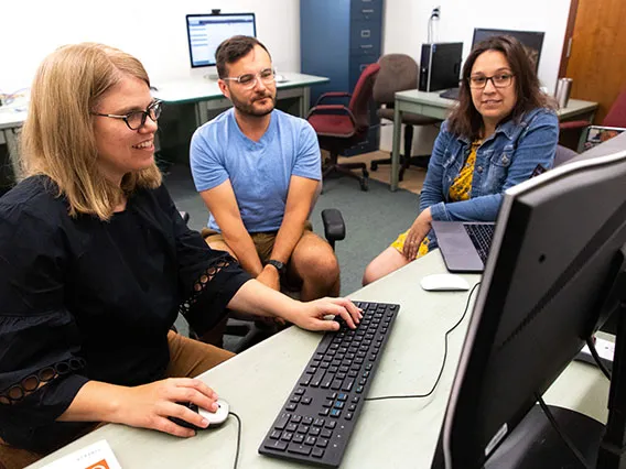 UA English Professor Shelley Staples with students