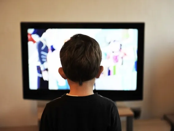 child watching TV