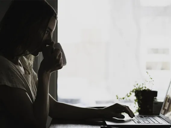 photo of person drinking coffee