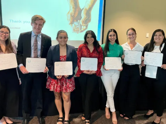 LASSO committee, seven college students holding certificates