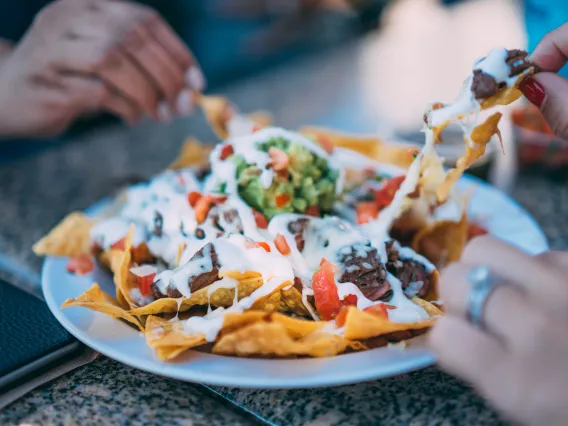 people eating nachos