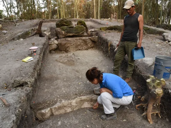 Melina García (front) excavates the central part of Aguada Fenix, the largest and oldest Maya monument ever uncovered.