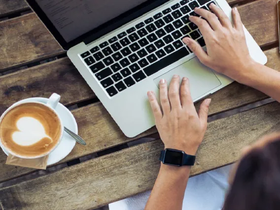 Person typing on laptop