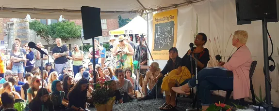 Speakers and audience in the SBS tent at the Tucson Festival of Books