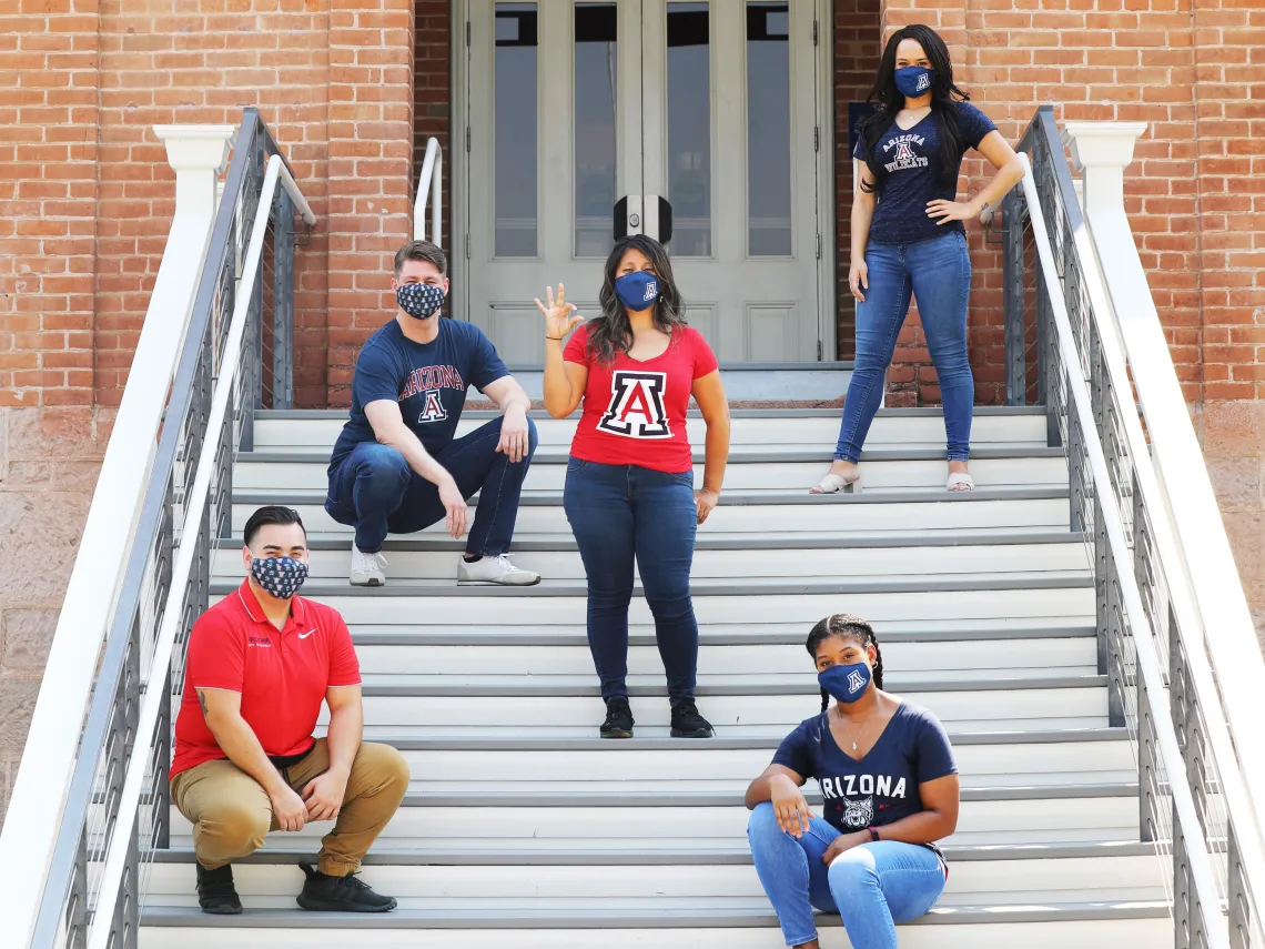 Scholarship recipients on the steps of Old Main 