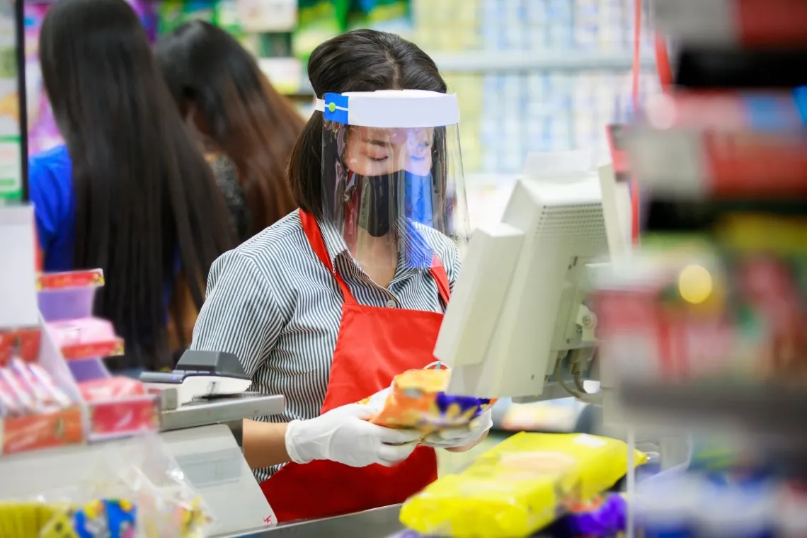 grocery store worker with mask