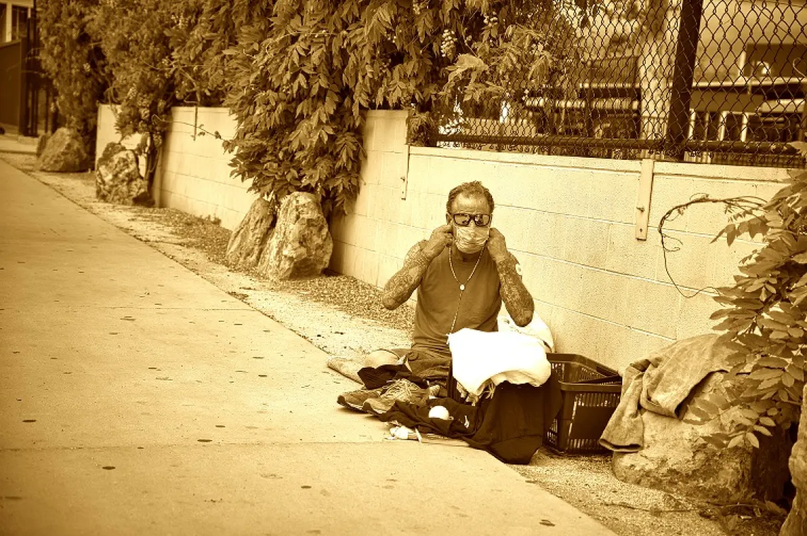 homeless man with mask