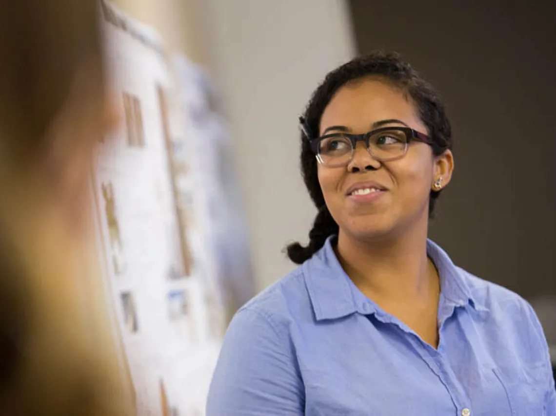 Woman looking at white board