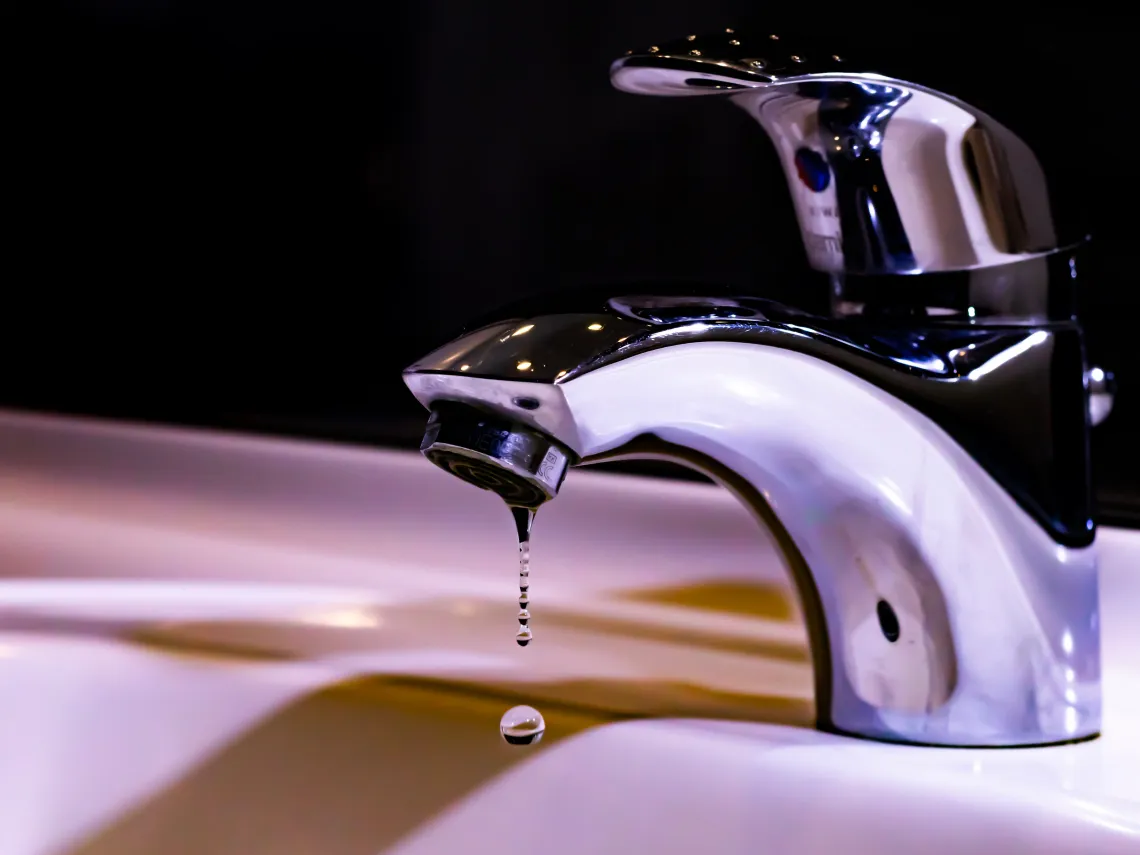 faucet with water dripping