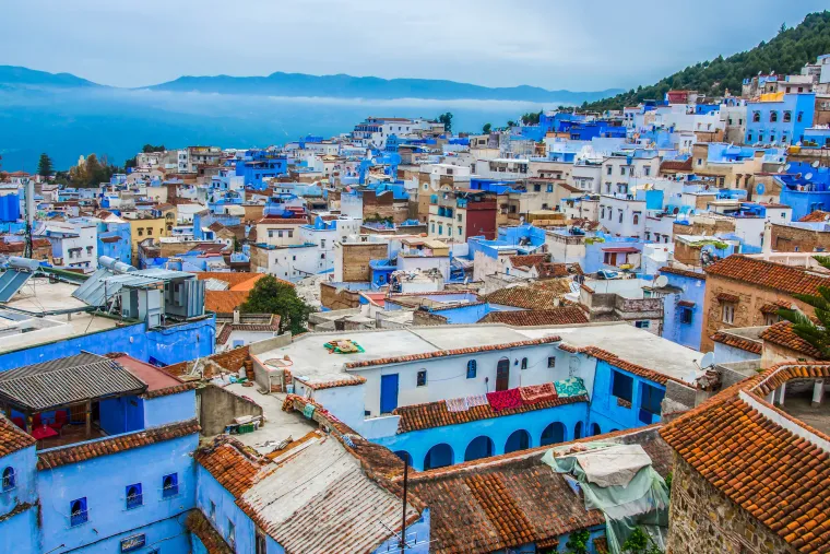 Blue buildings and mountains in Morocco