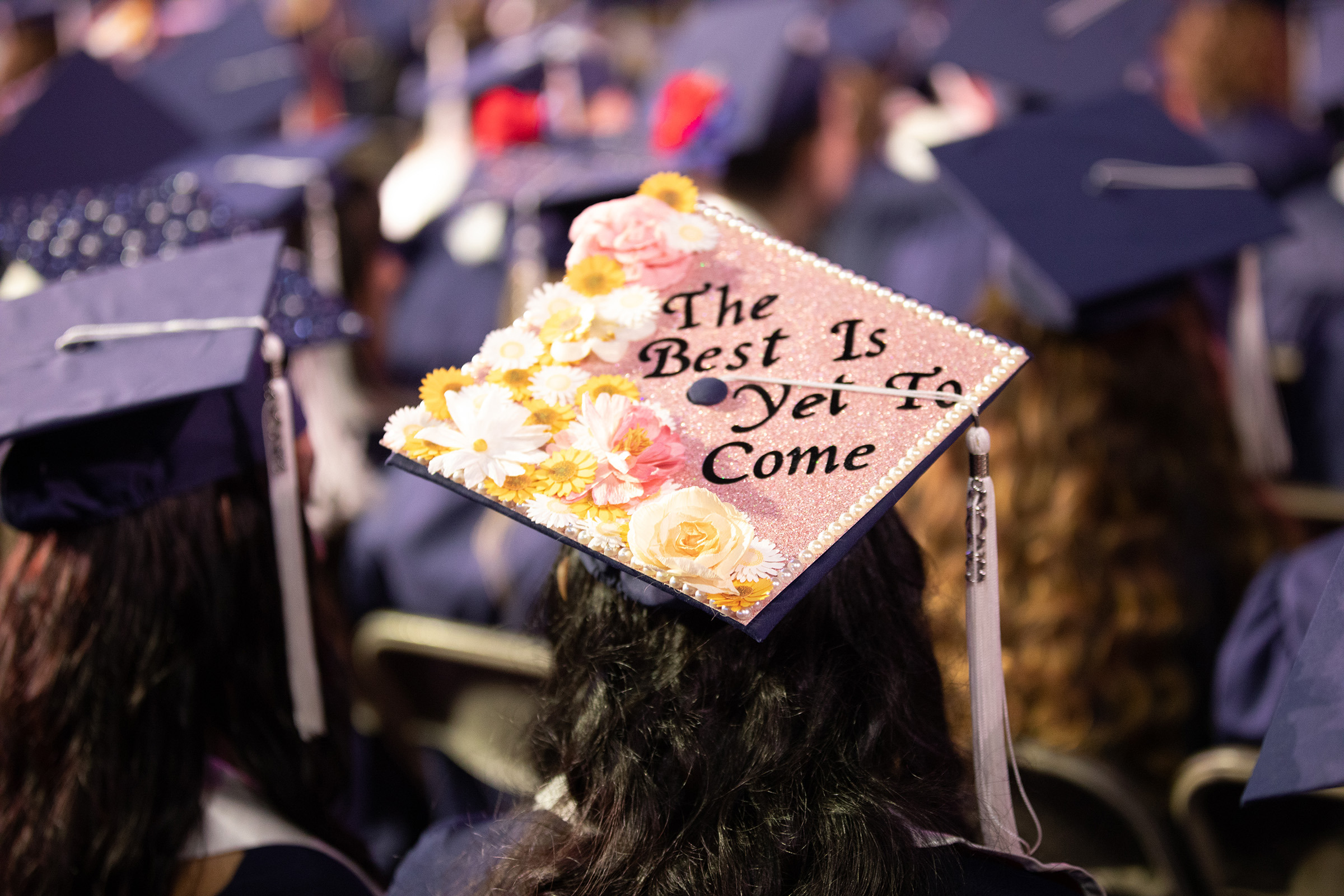 graduation cap with the words "the best is yet to come"
