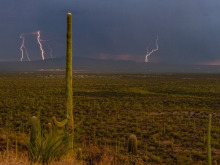 Lightning strikes during a monsoon storm west of Tucson 